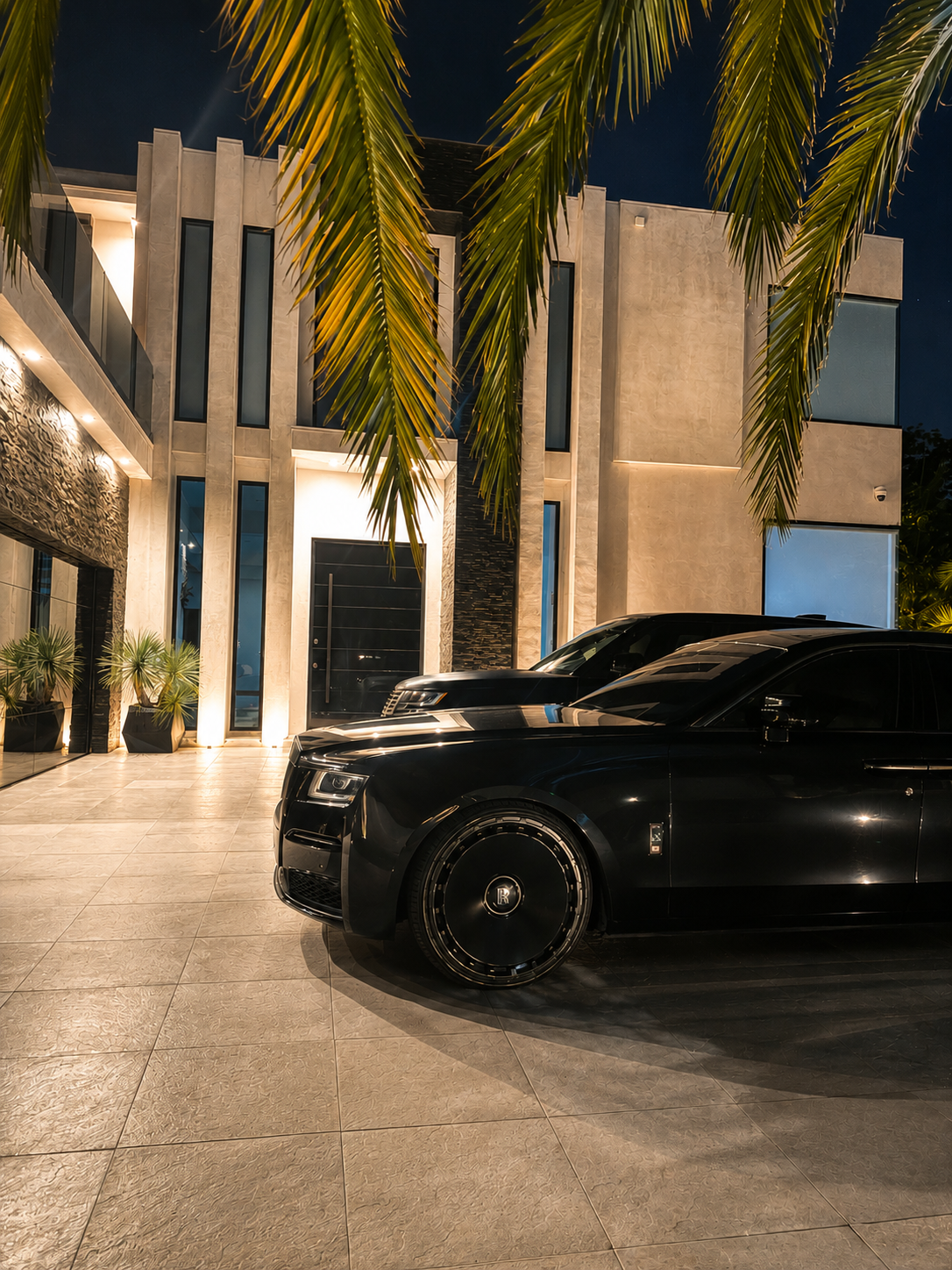 Rolls-Royce Ghost at a Los Angeles estate at night